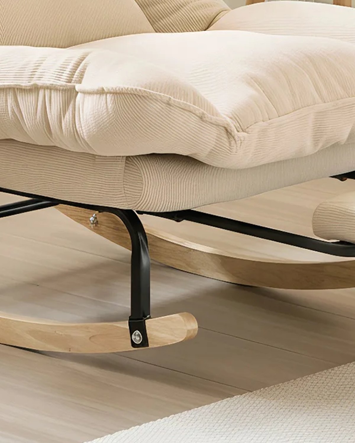 Close-up of the frame and legs of The Interlude Reclining Rocking Chair